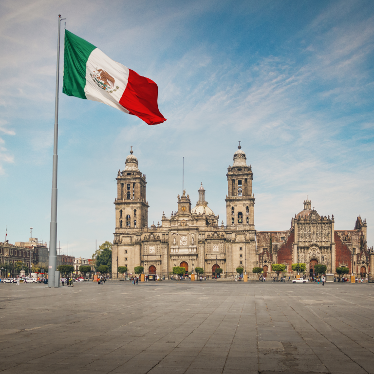 image with mexico flag and historical buildings