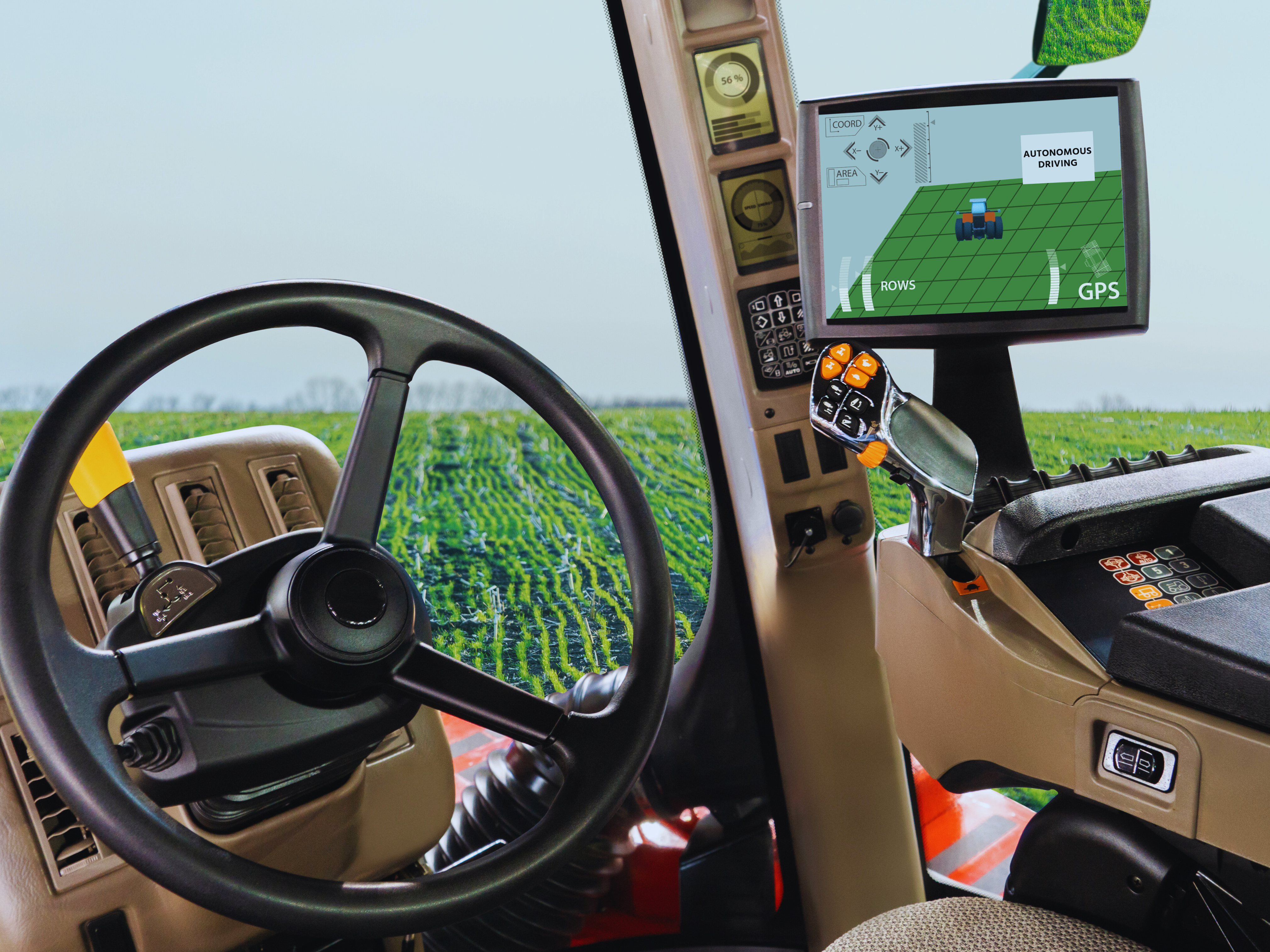 Interior of tractor with GPS with green field and sky background